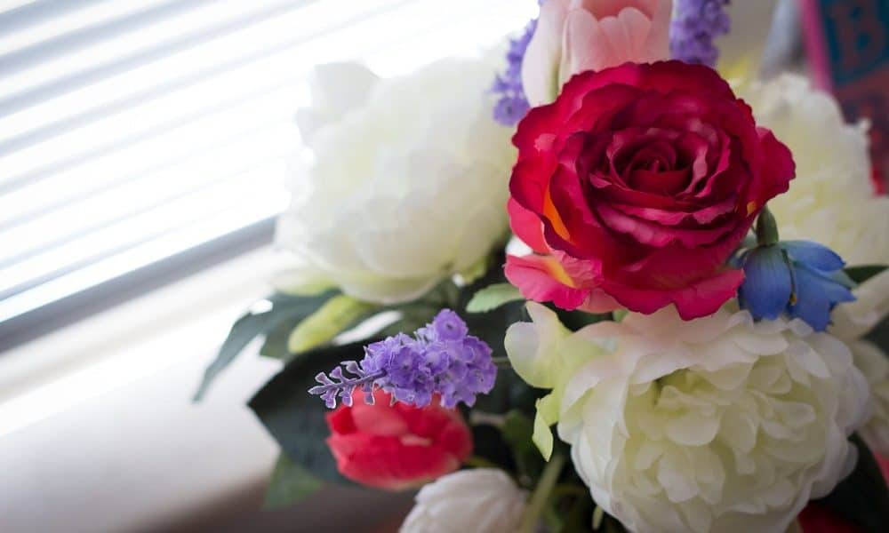 Beautiful artificial flowers in bright pinks, whites, and lilacs