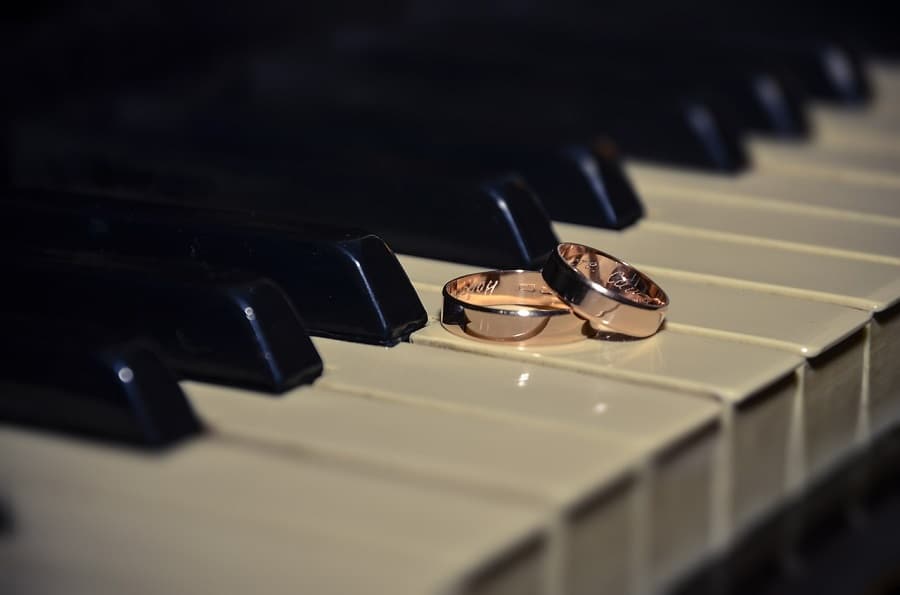Piano and wedding rings