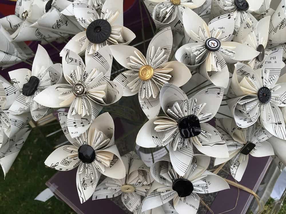 A floral bouquet made of sheet music.