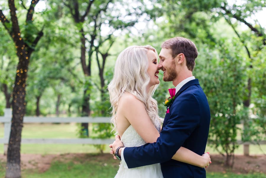 smiling bride and groom