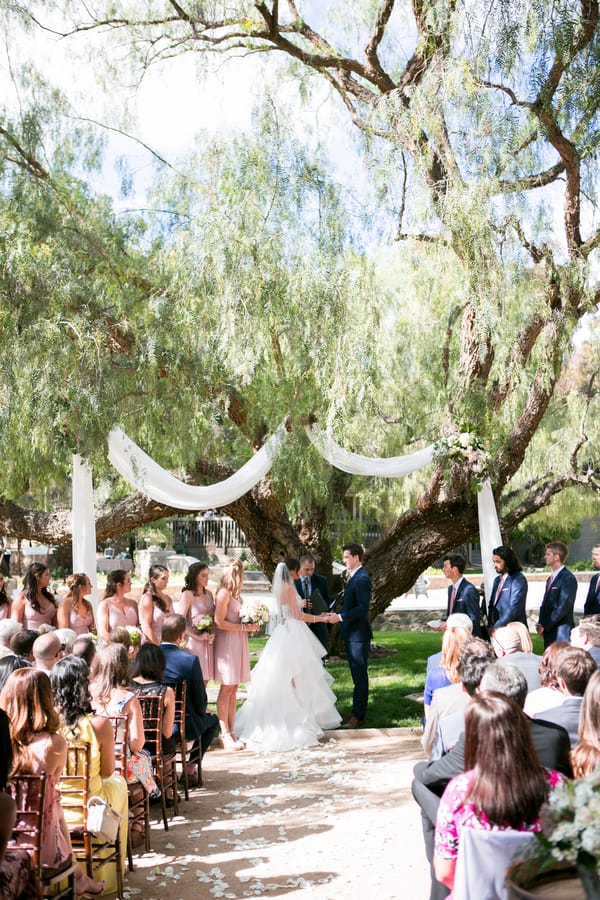 Lauren & Jake's Travel-Themed Vineyard Wedding