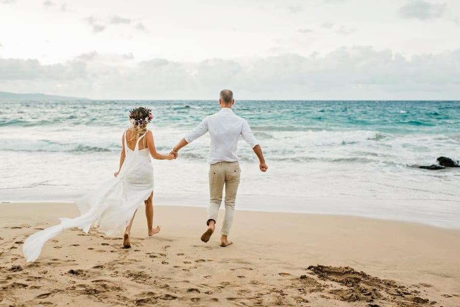 walking hand in hand across the sea