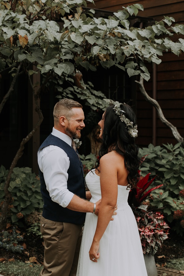 smiling bride and groom